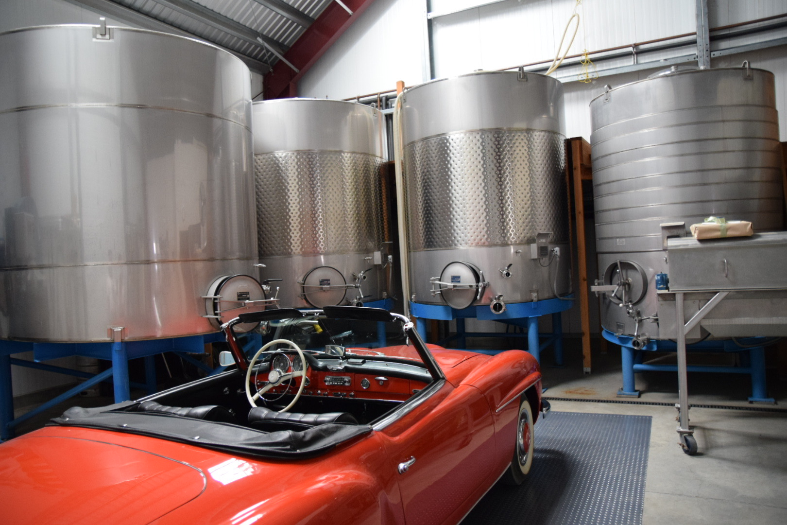 classic car and wine tanks